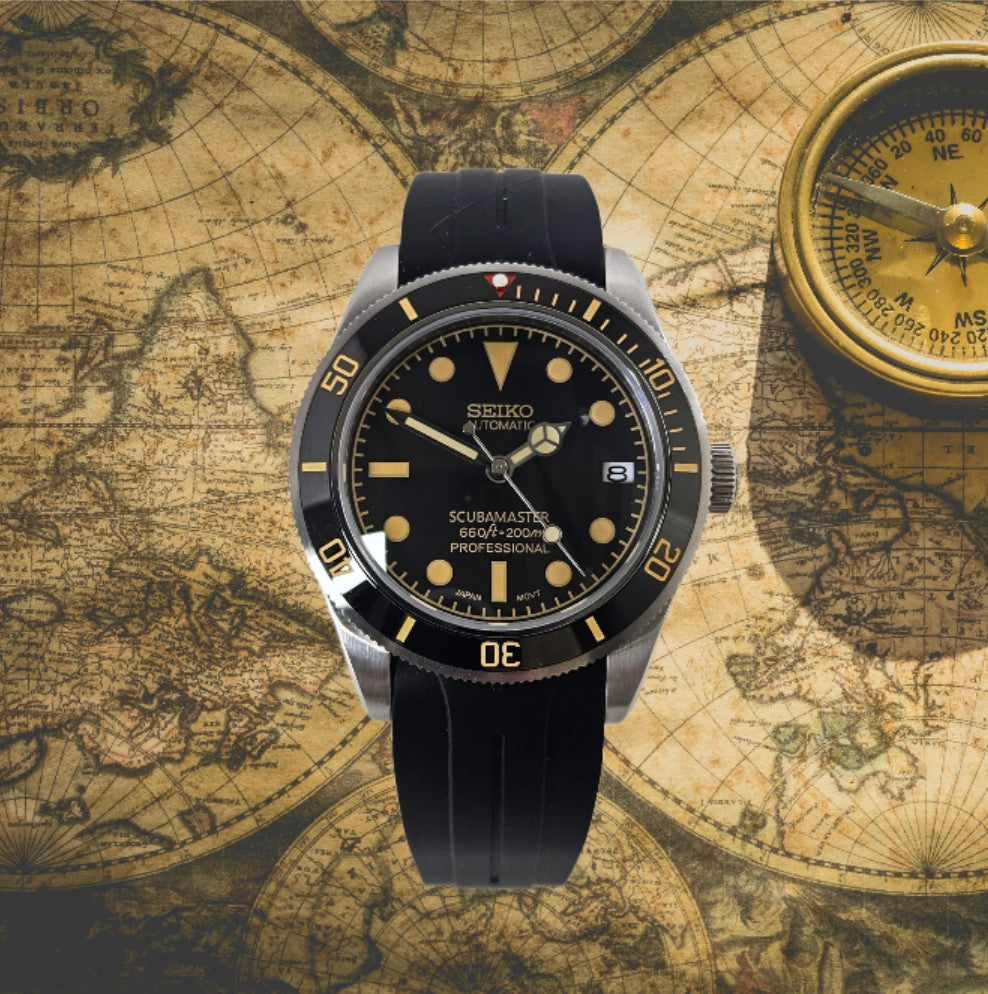 Seiko watch on an old world map with a compass
