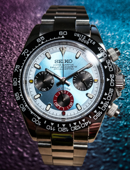 Seiko watch with a detailed face on a textured blue and purple background