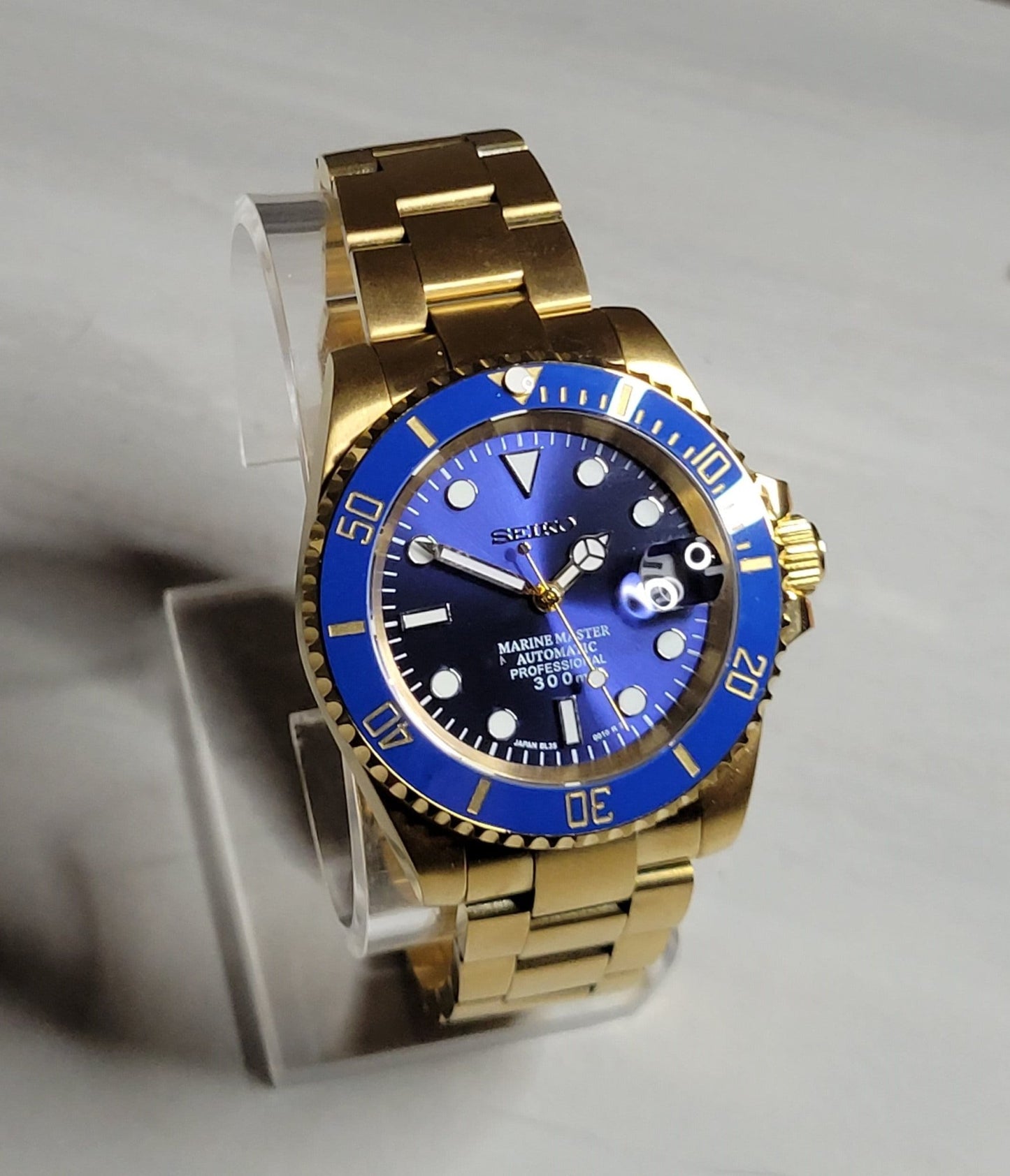 Seiko Custom Mod Watch Build - Gold with Blue Dial Ceramic Bezel powered by NH35 Automatic Movement - Sunshine Custom Watch